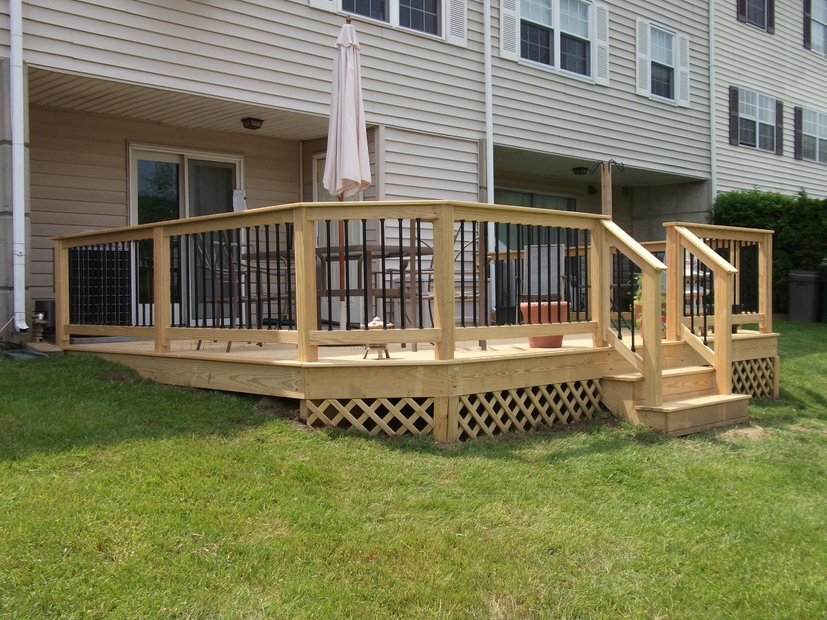 Deck Railing And Spindles Vinyl And Wood Deck Rails Decks R Us intended for dimensions 1200 X 900