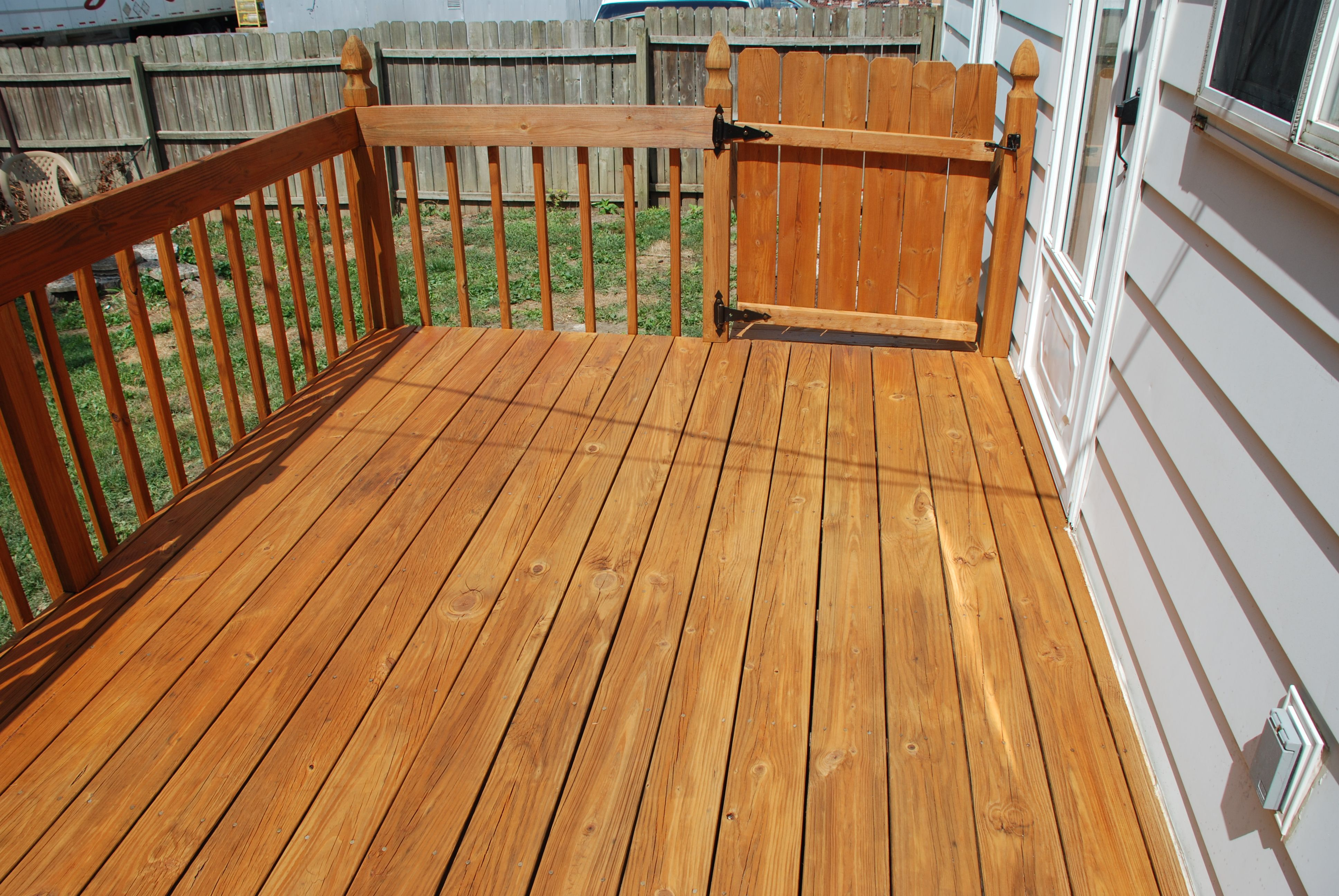 how to stain new pressure treated wood deck